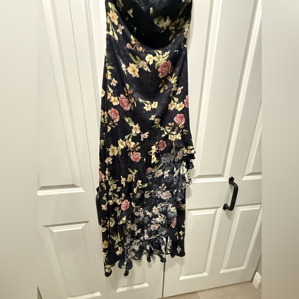 NWT, asymmetrical maxi dress! Smoke free home. Size medium